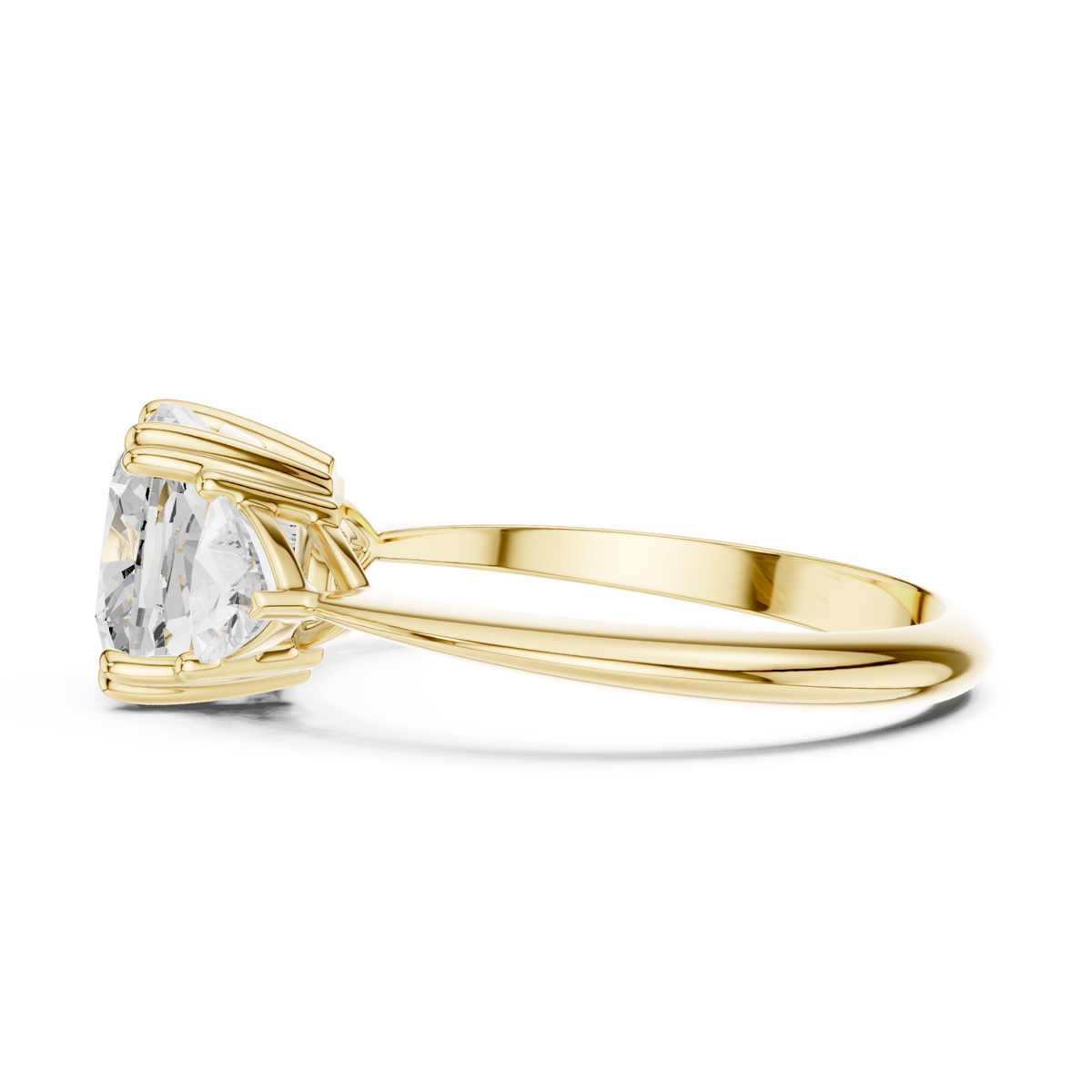 Cushion and trillion three-stone ring yellow gold angle view