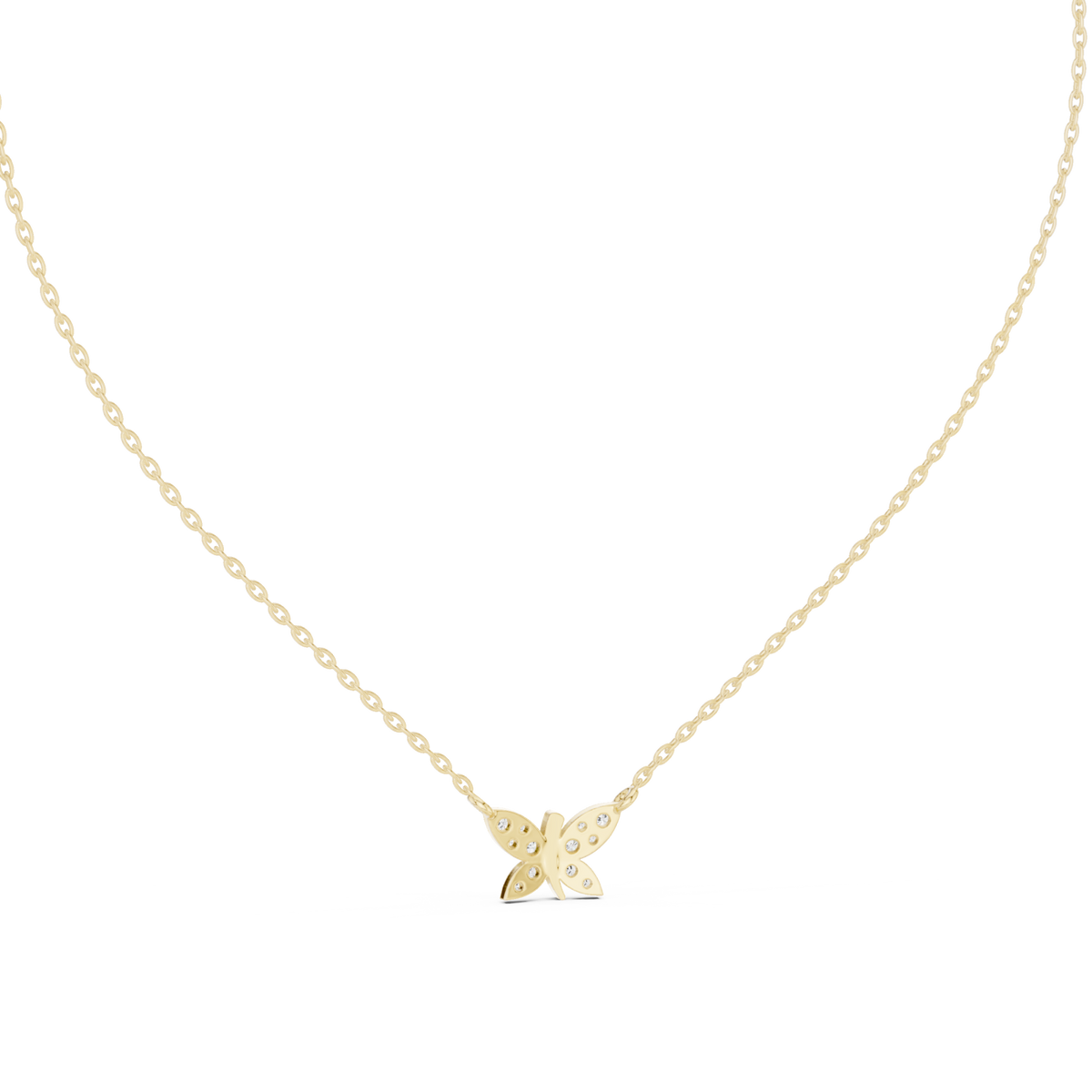 Diamond butterfly pendant yellow gold detail view