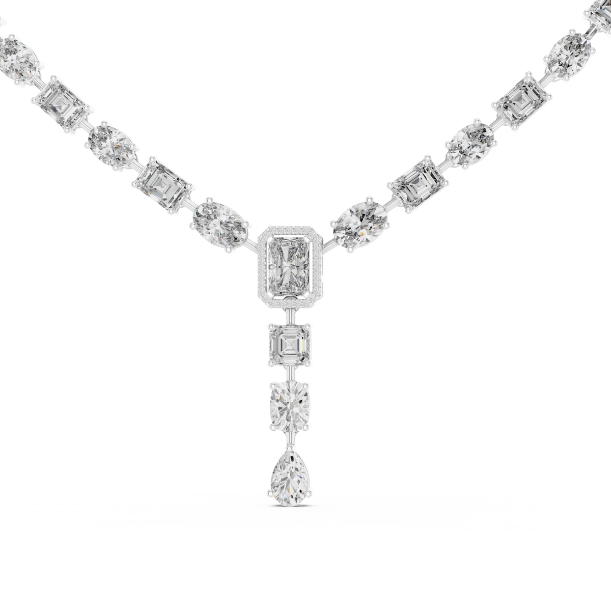 East-west oval and emerald-cut y-drop necklace white gold detail view