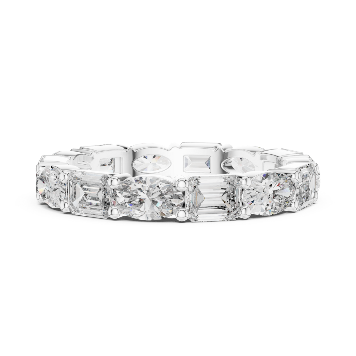 East-west oval and emerald eternity band white gold angle view