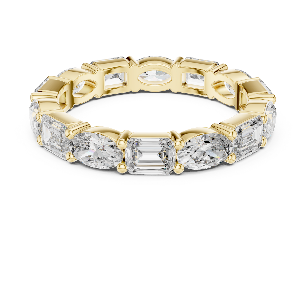 East-west oval and emerald eternity band yellow gold detail view