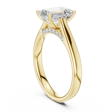 Emerald accent shoulder cathedral solitaire engagement ring yellow gold front view