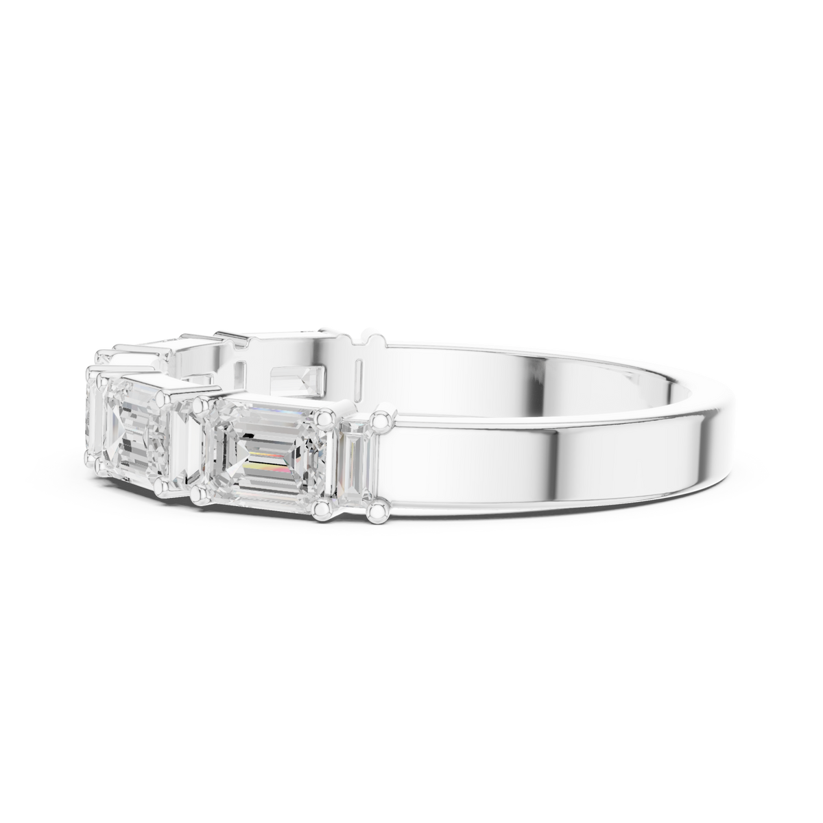 Emerald and baguette east-west half band white gold angle view