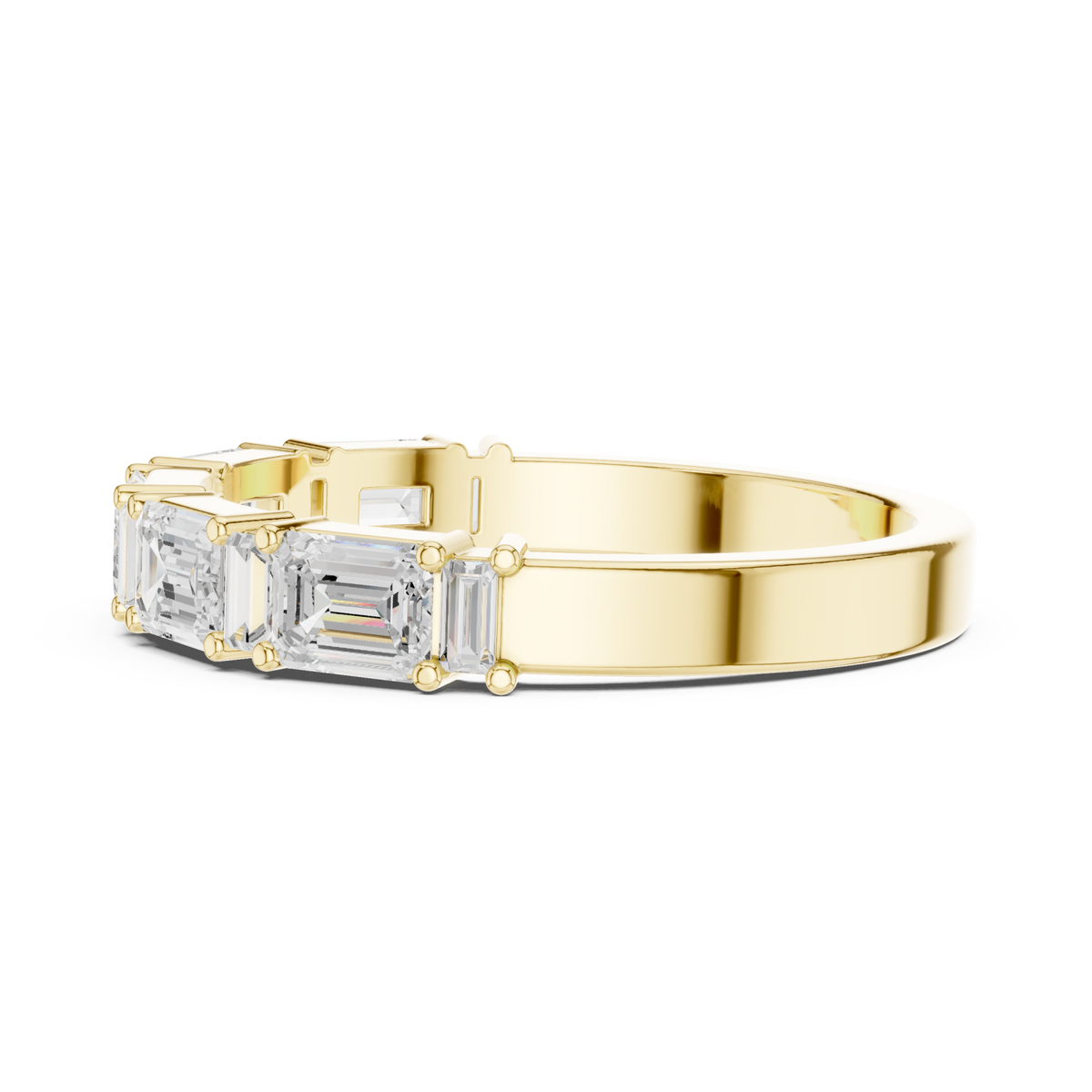 Emerald and baguette east-west half band yellow gold angle view