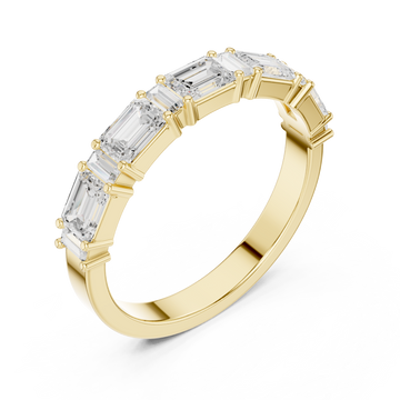 Emerald and baguette east-west half band yellow gold front view