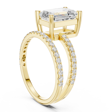 Emerald asymmetric crossover pave ring yellow gold front view