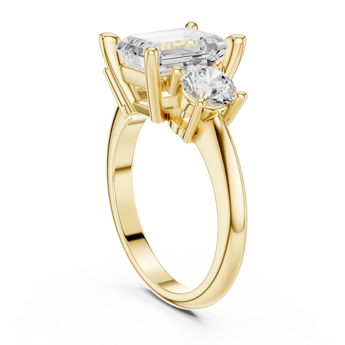 Emerald classic three stone engagement ring yellow gold front view