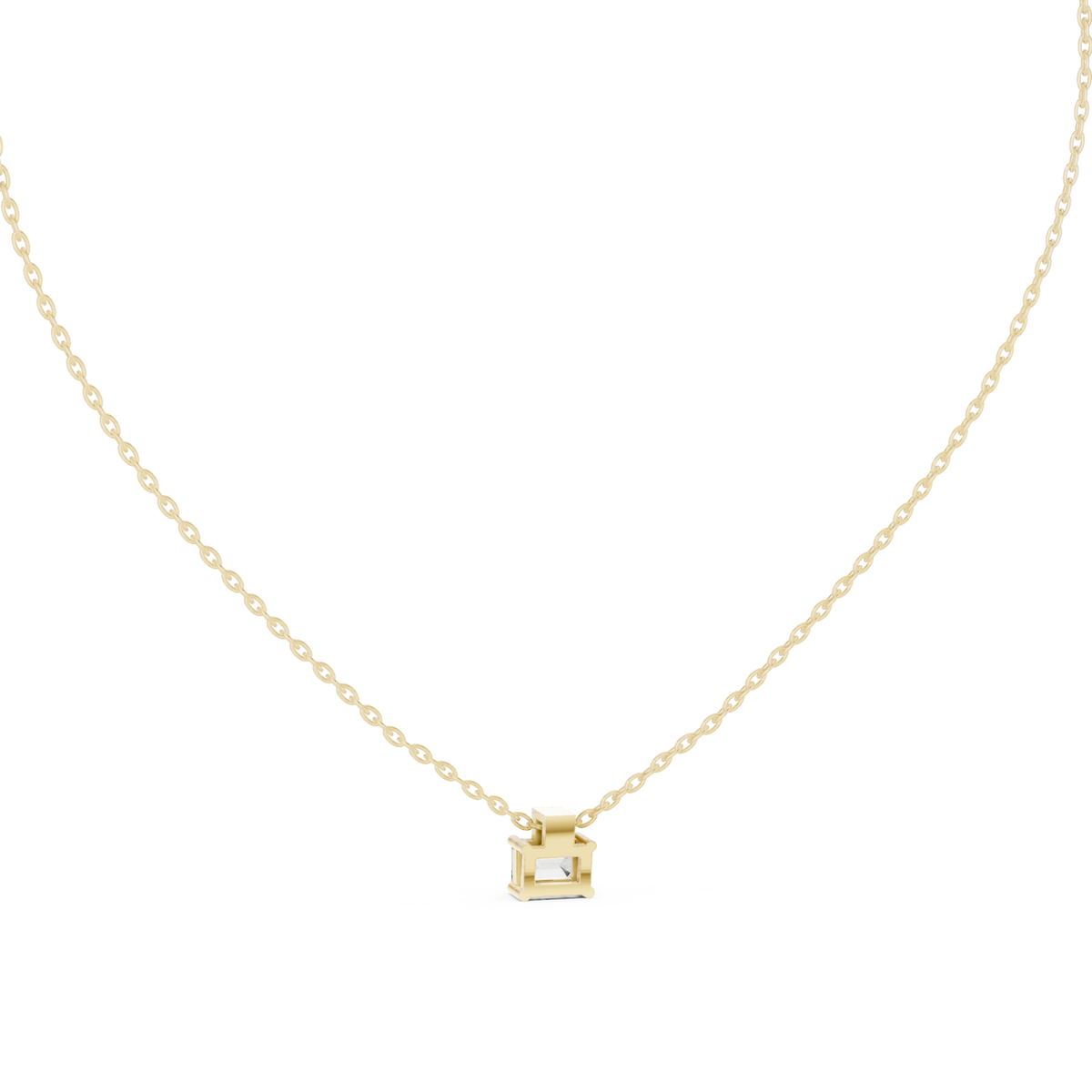 Emerald cut solitaire pendant with round accent yellow gold detail view
