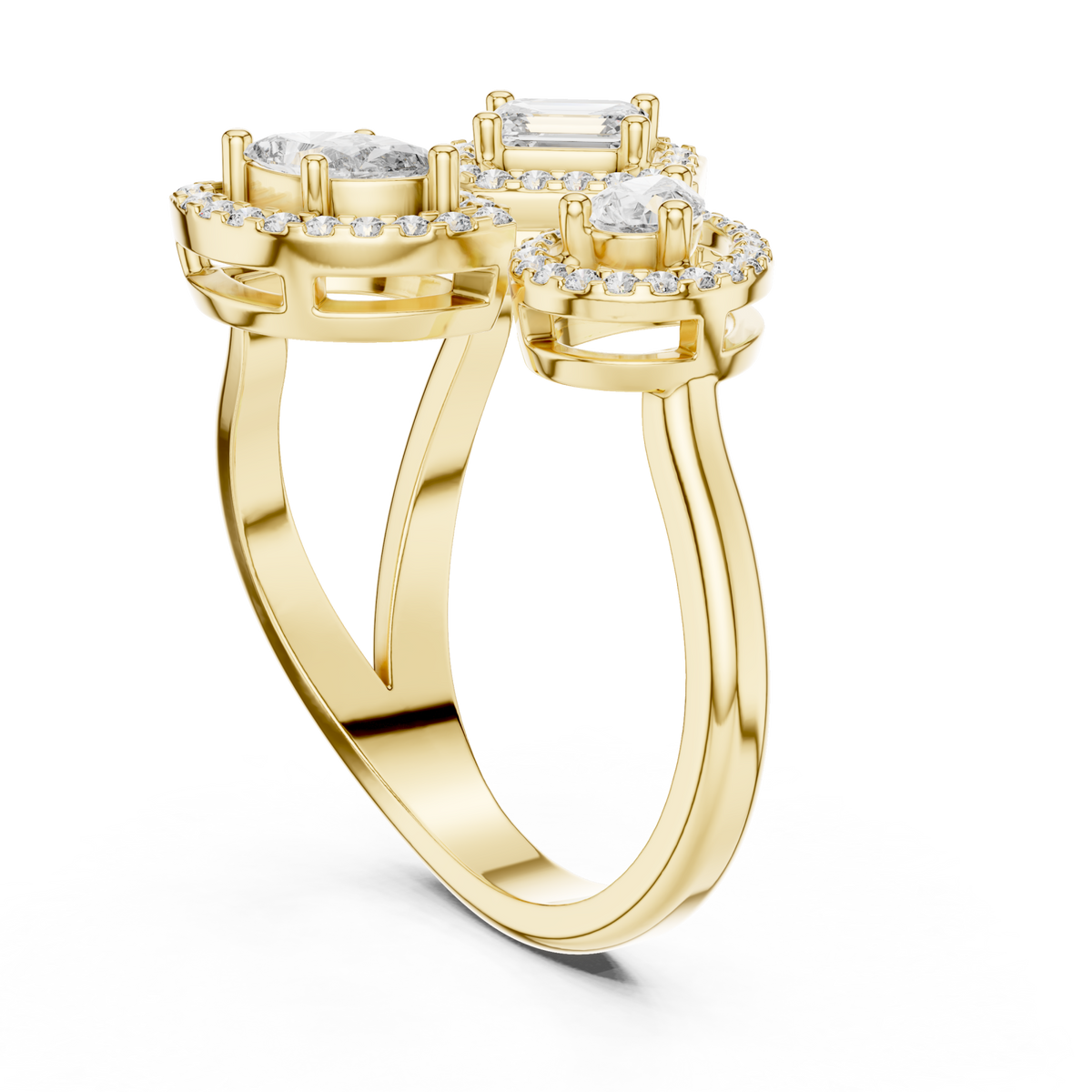 Emerald marquise pear halo trio ring yellow gold side view