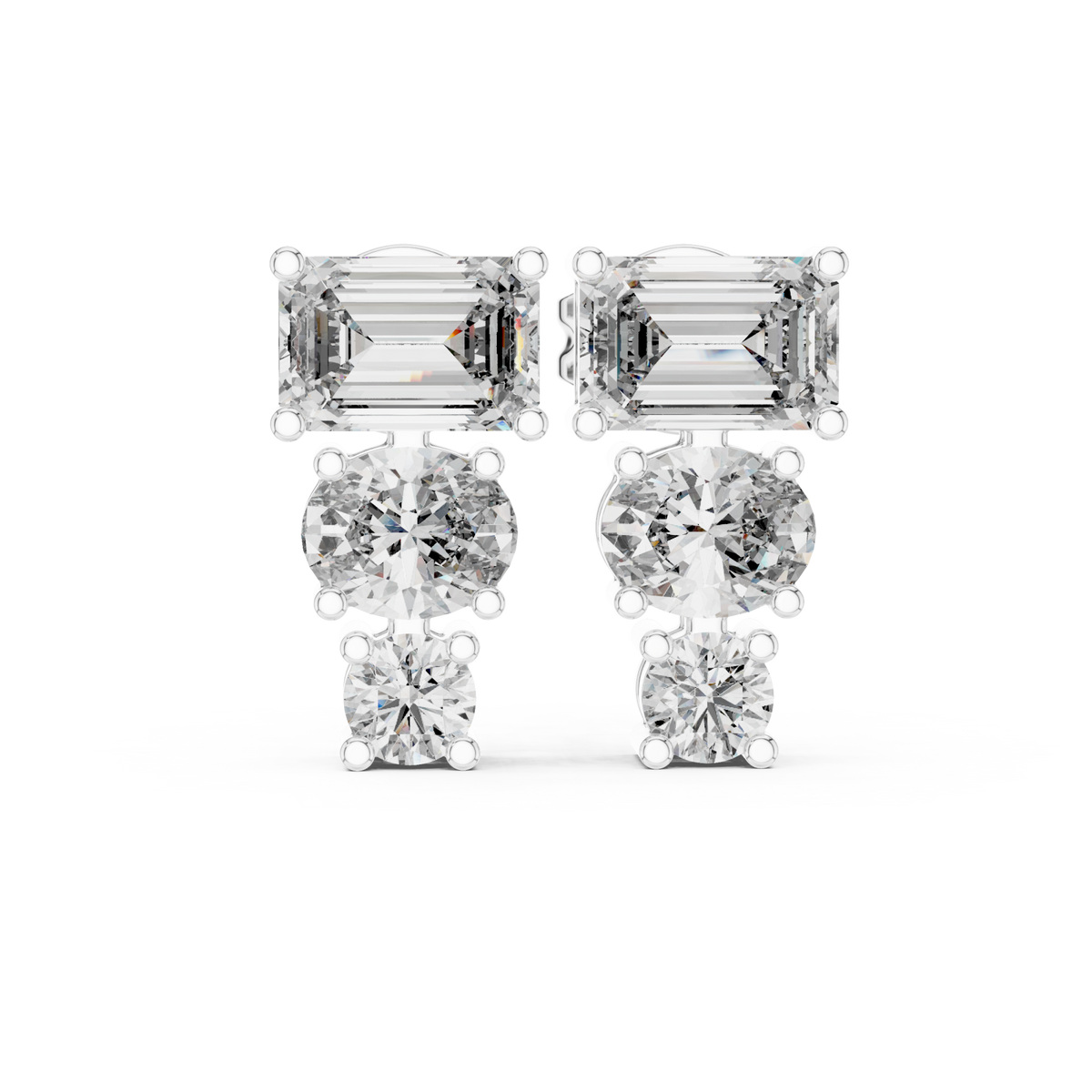  White Gold Emerald, Oval and Round Graduated Studs Detail View
