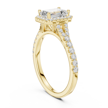 Emerald split bridge halo pave engagement ring yellow gold front view