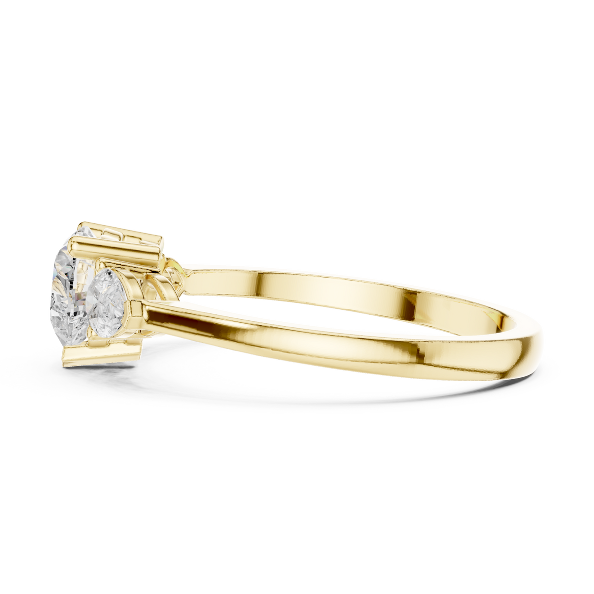 Heart and pear three-stone ring yellow gold angle view