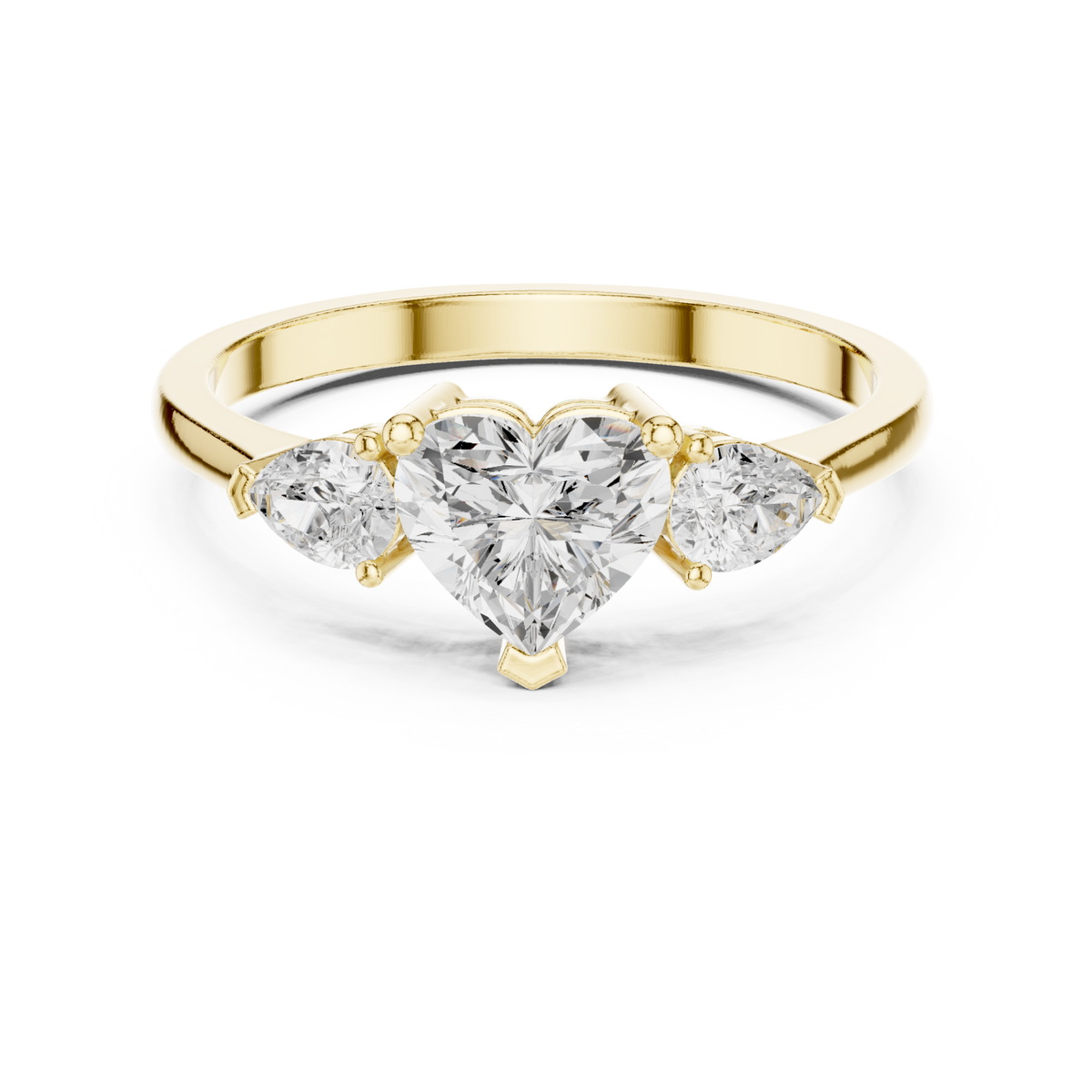 Heart and pear three-stone ring yellow gold detail view