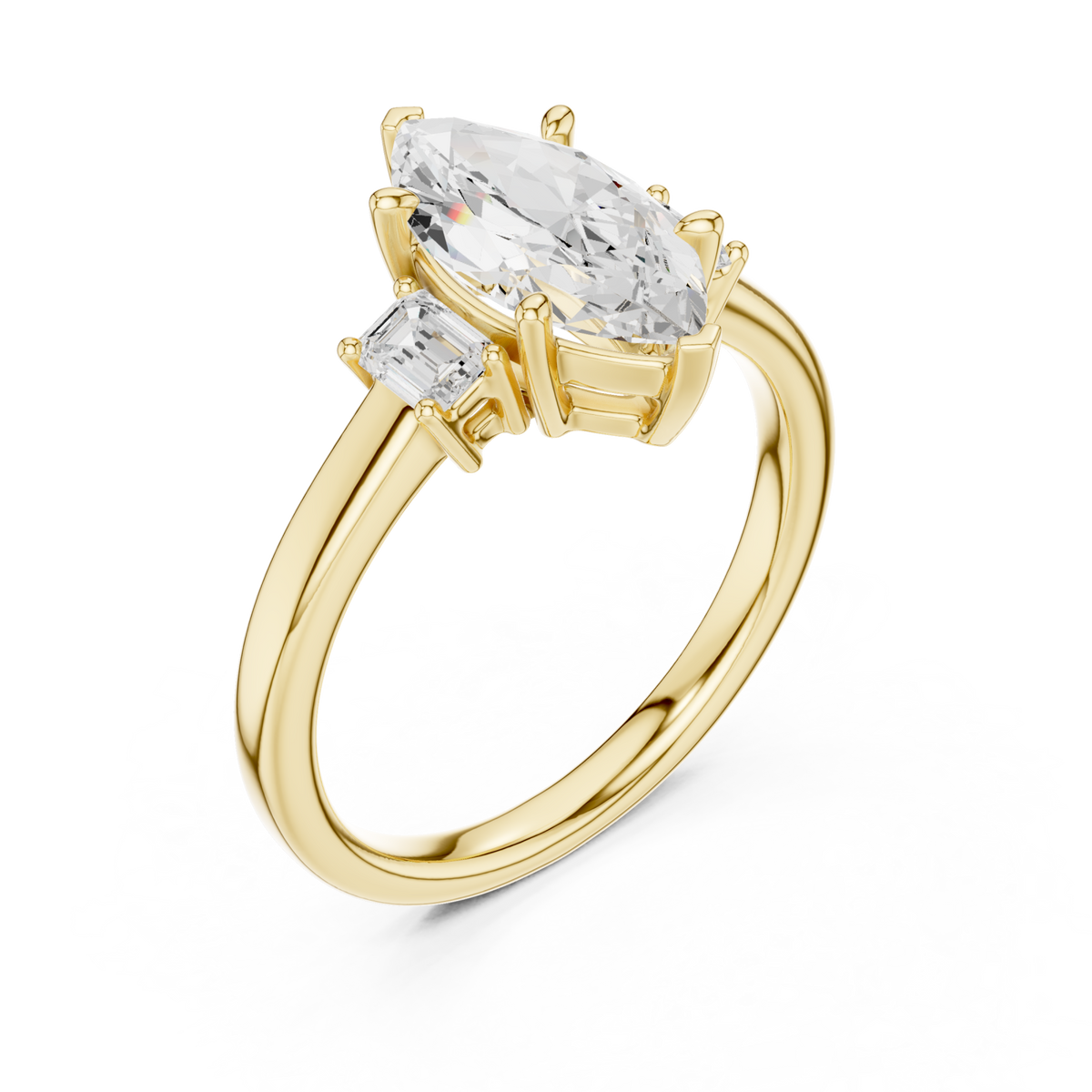 Marquise emerald side three stone engagement ring yellow gold angle view