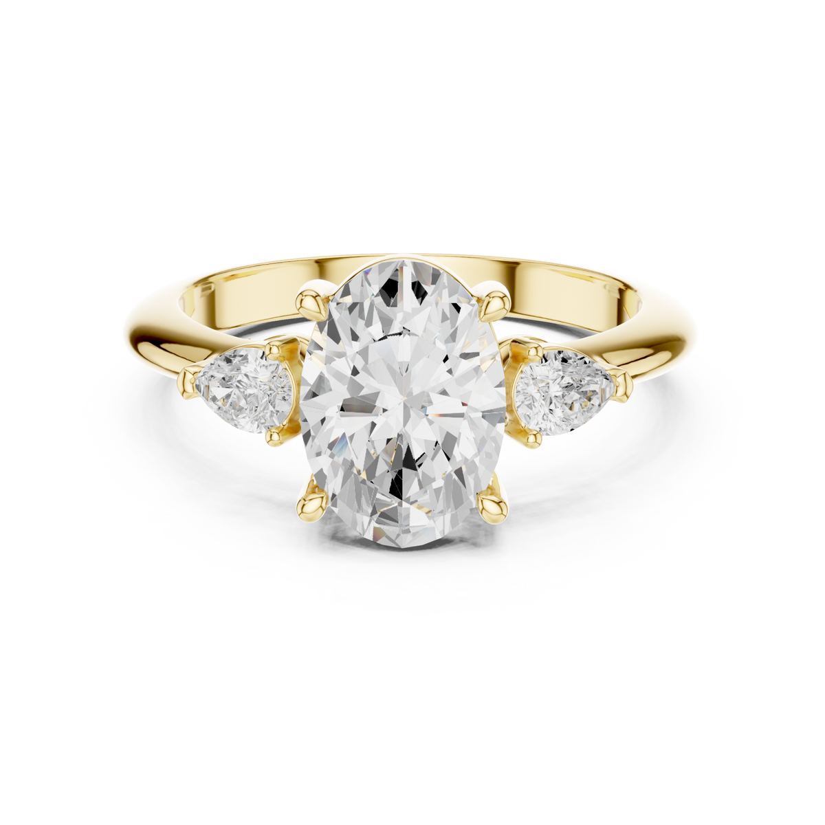 Oval east-west pear three stone engagement ring yellow gold detail view