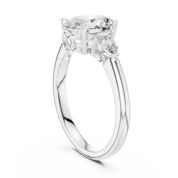 Oval pear side three stone engagement ring white gold front view