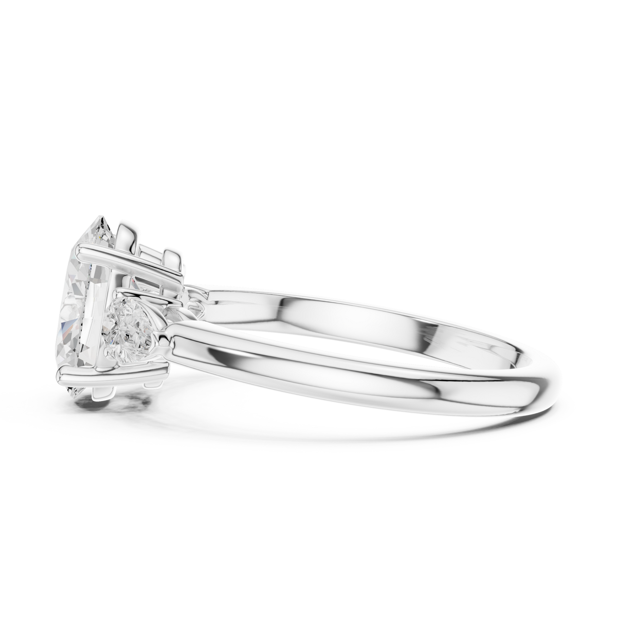 Oval pear side three stone engagement ring white gold side view