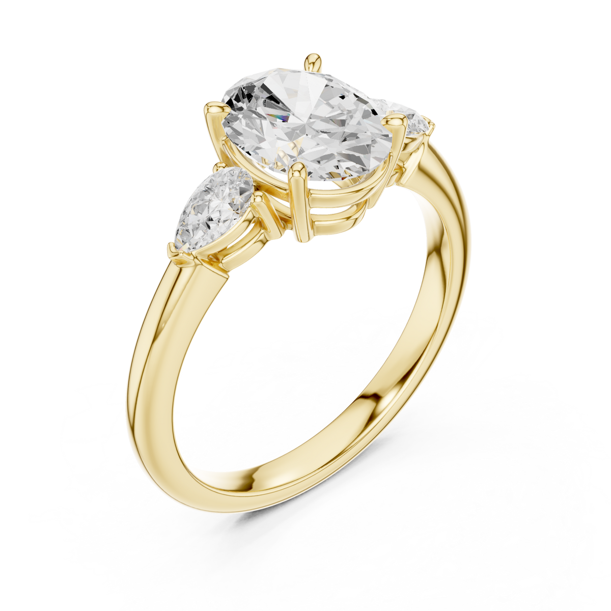 Oval pear side three stone engagement ring yellow gold angle view