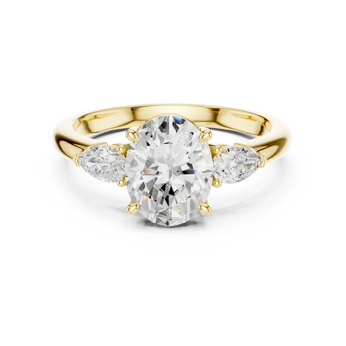 Oval pear side three stone engagement ring yellow gold detail view