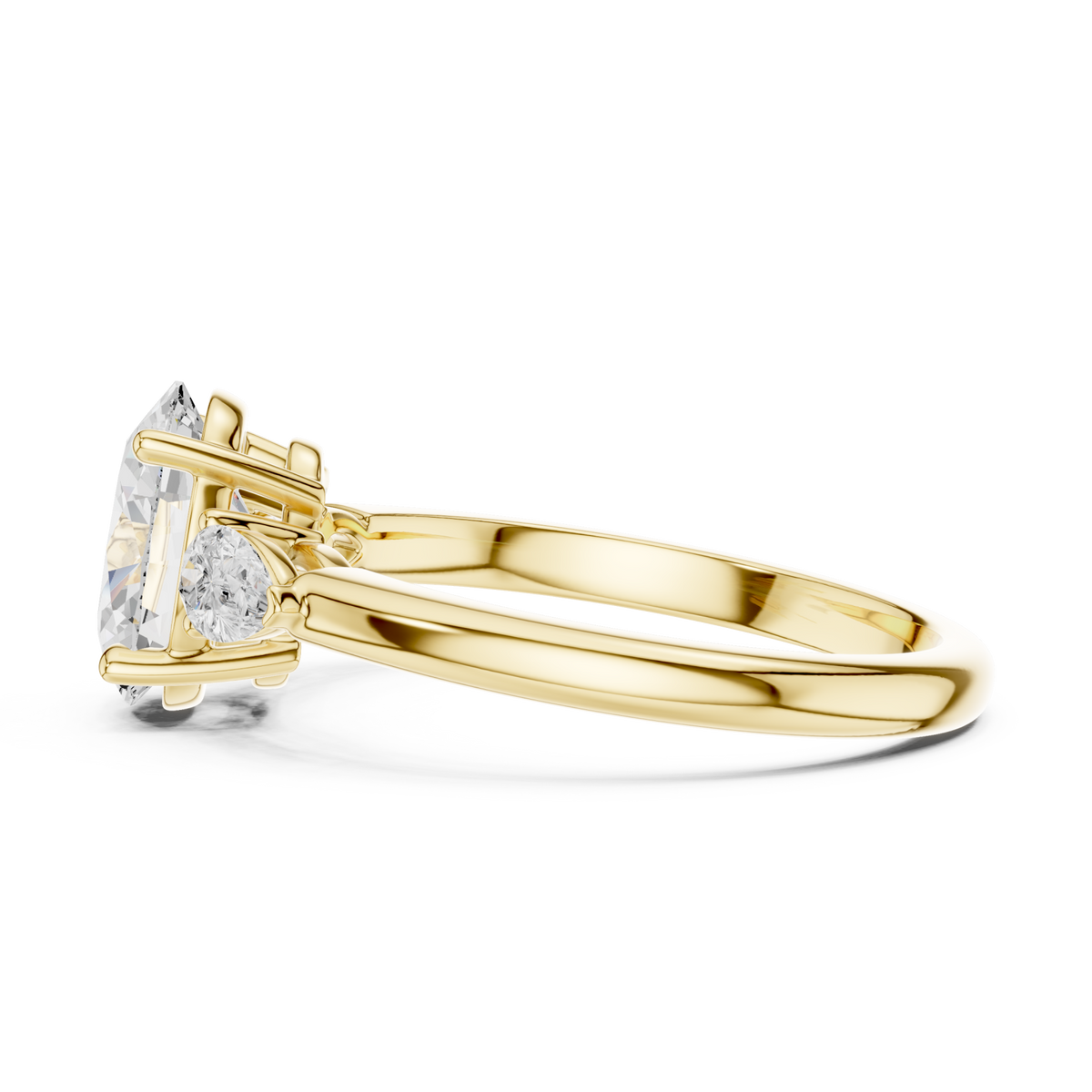 Oval pear side three stone engagement ring yellow gold side view