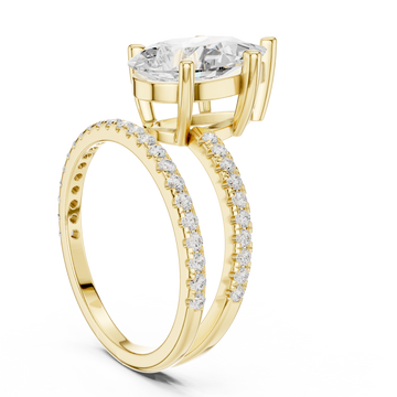 Pear asymmetric crossover pave ring yellow gold front view