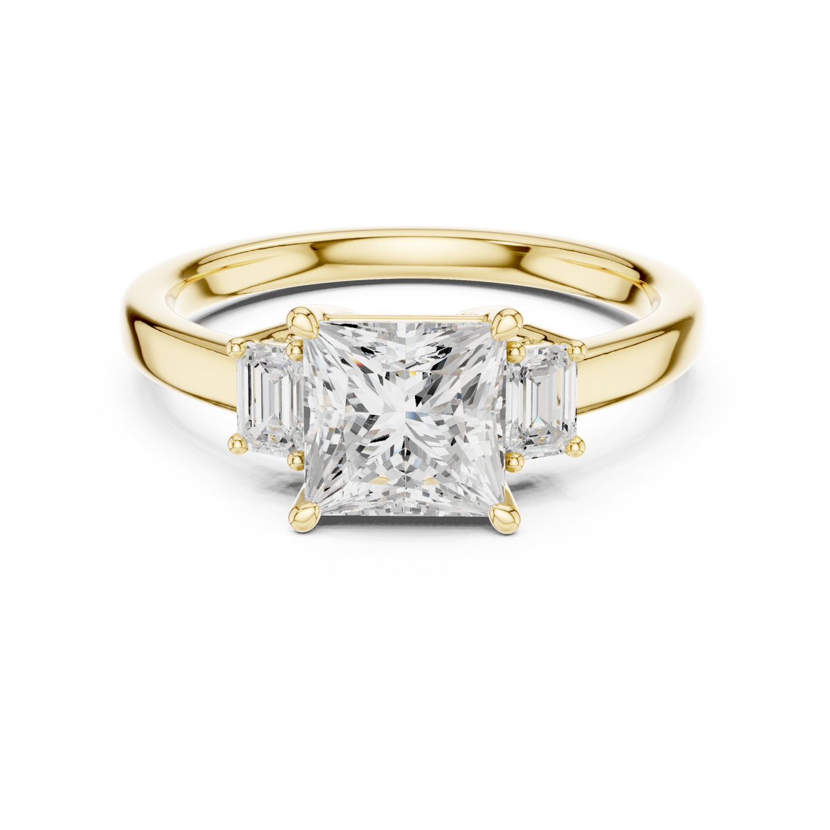 Pear emerald side three stone engagement ring yellow gold detail view