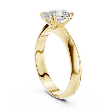 Pear knife-edge solitaire engagement ring yellow gold front view