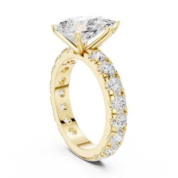 Pear shared-prong accent engagement ring yellow gold front view
