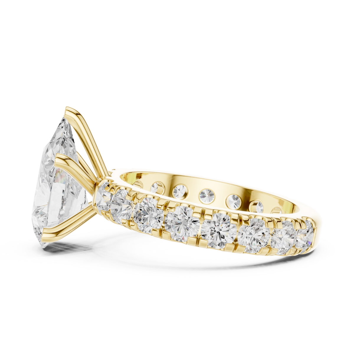Pear shared-prong accent engagement ring yellow gold side view