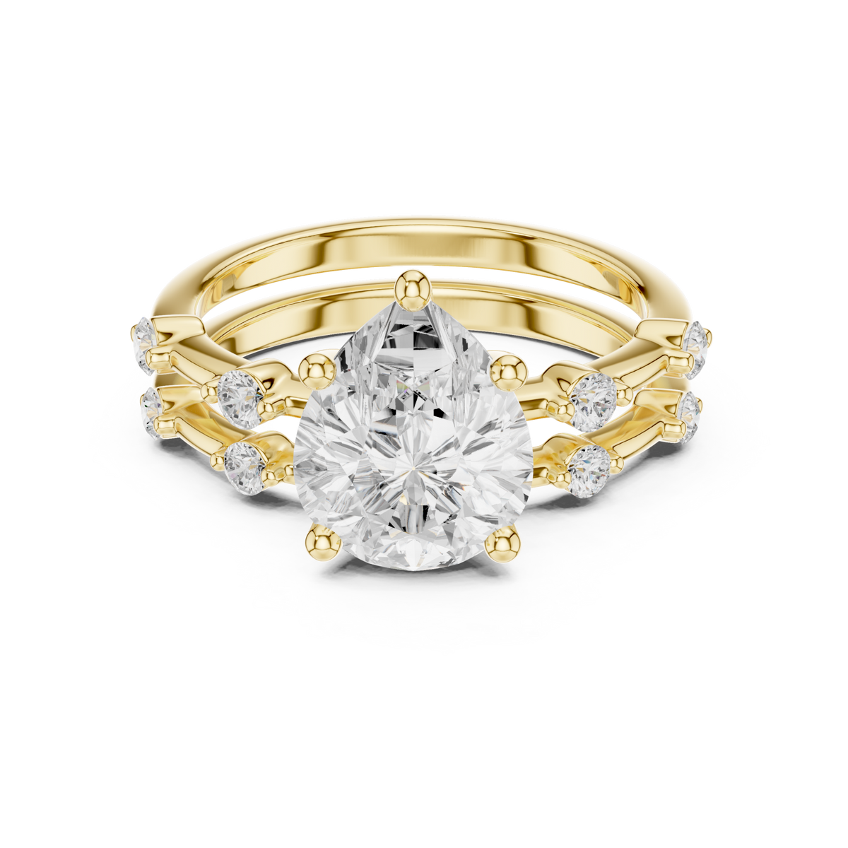 Pear spaced accent bridal set yellow gold detail view