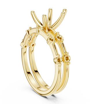 Pear spaced accent bridal set yellow gold front view