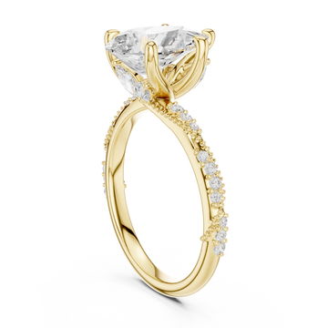 Pear twist pave engagement ring yellow gold front view