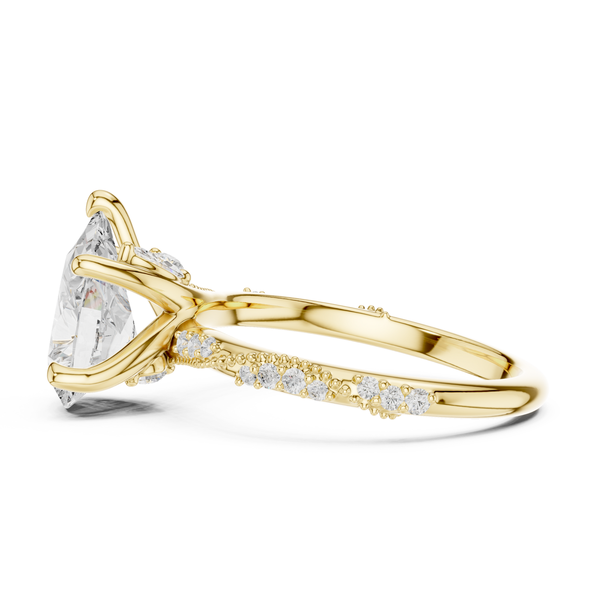 Pear twist pave engagement ring yellow gold side view