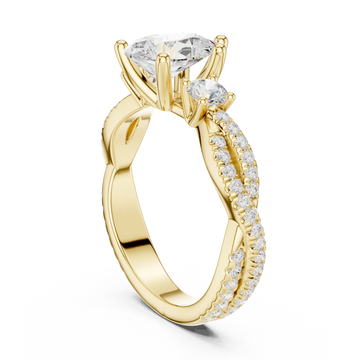 Pear twist three stone engagement ring yellow gold front view