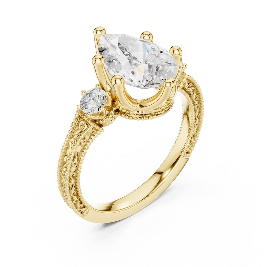 Pear vintage engraved three stone ring yellow gold front view