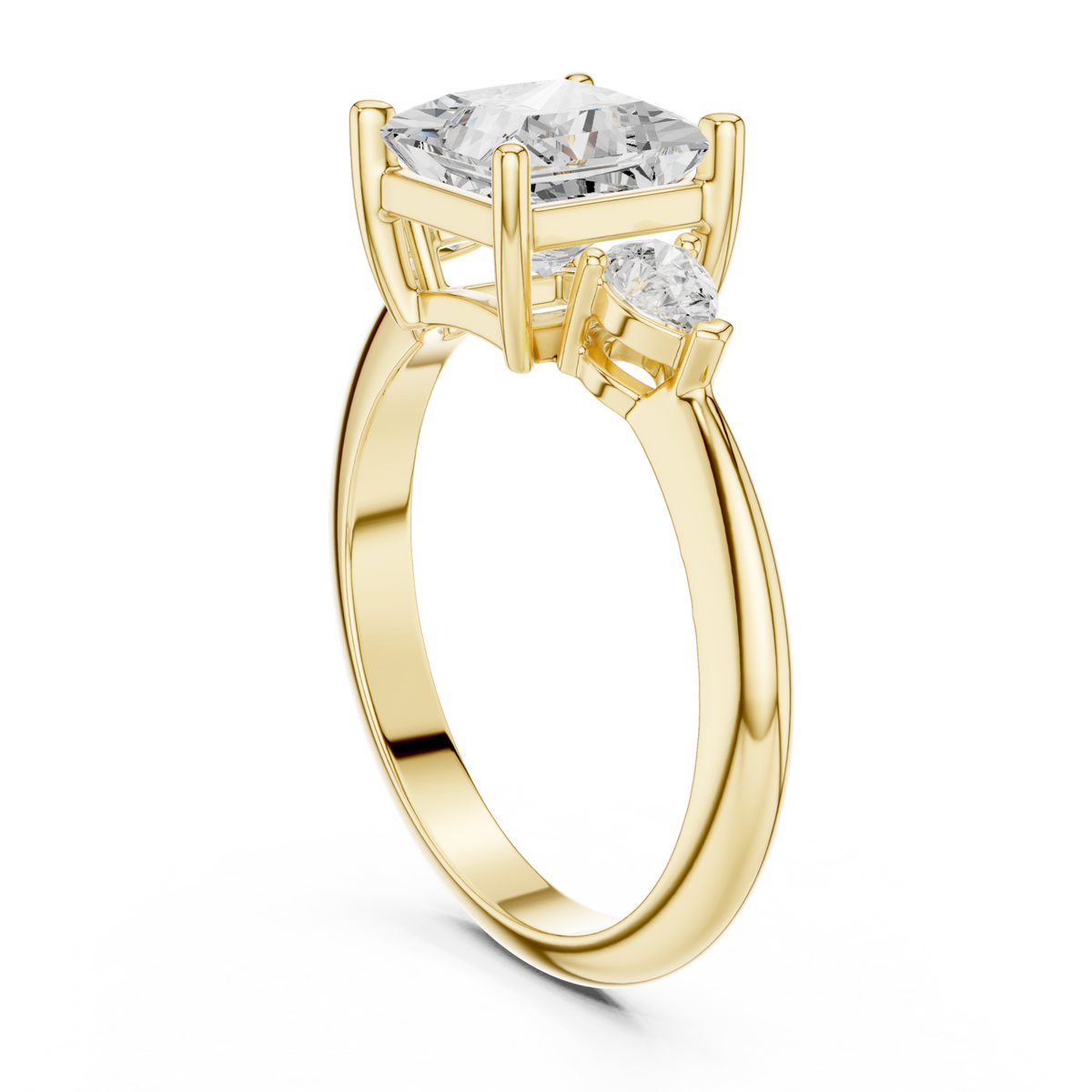 Princess east-west pear three stone engagement ring yellow gold front view