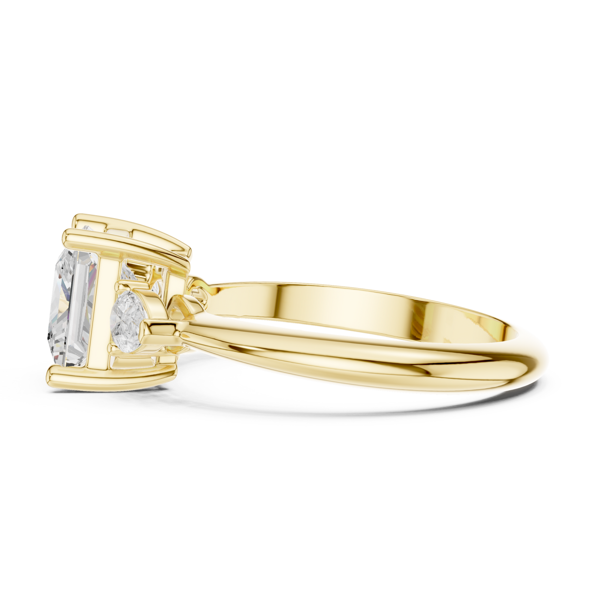 Princess east-west pear three stone engagement ring yellow gold side view