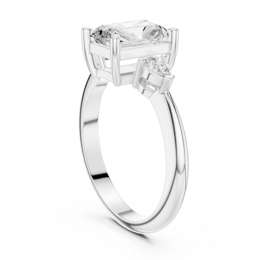 Radiant east-west pear three stone engagement ring white gold front view