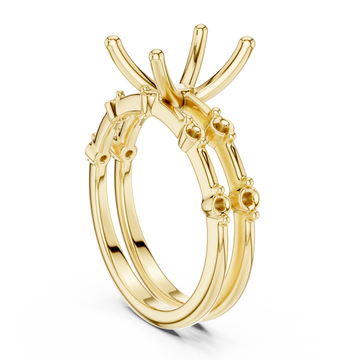 Radiant spaced accent bridal set yellow gold front view